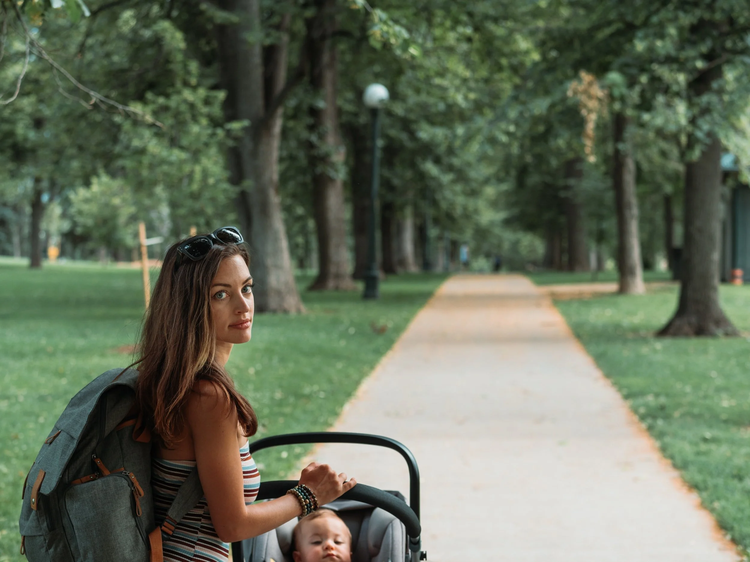 Mom holds baby I Therapist for Moms I Therapist in Miami, FL I Counselor in Miami, FL I Couples therapist in Miami I Teen counselor in Miami I Therapist for Teens in Miami