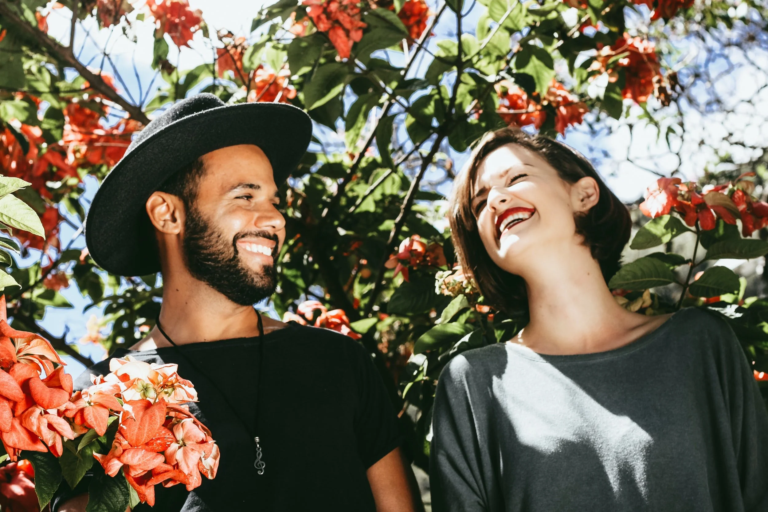 Couple smile at eachother after online anxiety therapy in florida with a couples therapist in miami, fl who offers anxiety counseling miami, couples therapy in miami, fl , marriage counseling in miami, fl and anxiety counseling in miami, fl.
